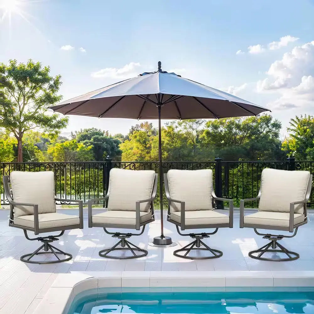 Outdoor patio setting with four cushioned swivel chairs and large umbrella by swimming pool